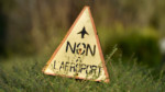 A picture taken on January 16, 2018 shows a sign reading "No to the airport" in the "Zad" ("zone a defendre", zone to defend) of Notre-Dame-des-Landes, outside Nantes. 
The 'Zad' of Notre-Dame-des-Landes, where part of activists opposed to the construction of the airport are gathered, will be 'evacuated from its most radical elements' according to French Interior minister on January 16, 2018.  / AFP PHOTO / LOIC VENANCE